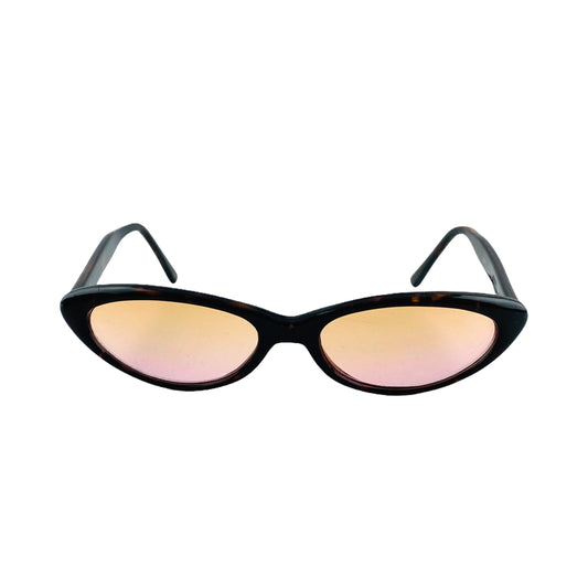 vintage 1990s black oval sunglasses with pink lenses